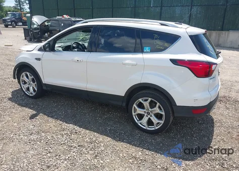 2019 Ford Escape Titanium z USA, uszkodzony, nr VIN 1FMCU9J90KUA84721